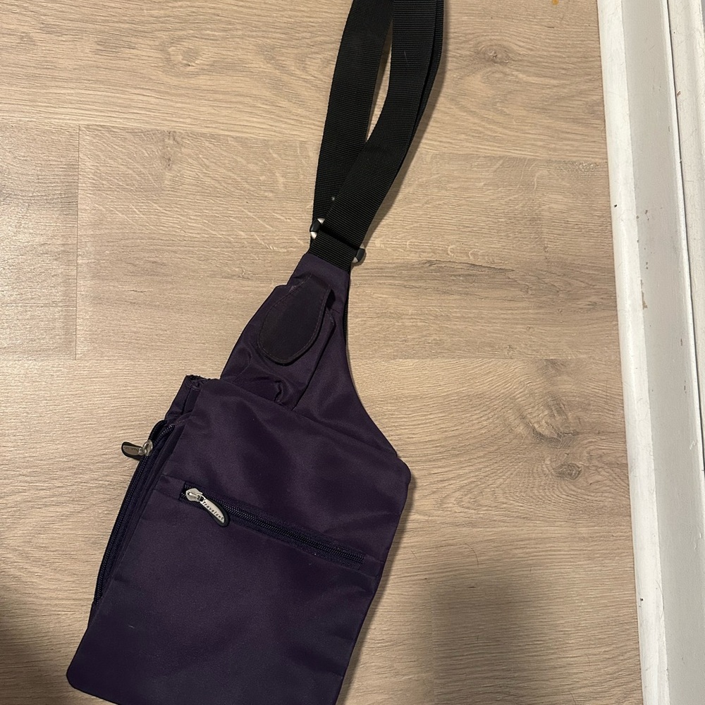 Travelon Purple Crossbody Bag with Long Strap and Zipper Closure